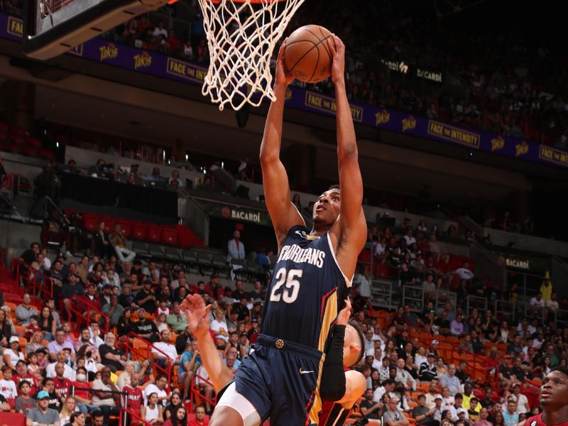 MIAMI, FL - JANUARY 22: Trey Murphy III #25 of the New Orleans Pelicans dunks the ball during the game against the Miami Heat on January 22, 2023 at Miami-Dade Arena in Miami, Florida. NOTE TO USER: User expressly acknowledges and agrees that, by downloading and or using this Photograph, user is consenting to the terms and conditions of the Getty Images License Agreement. Mandatory Copyright Notice: Copyright 2023 NBAE (Photo by Issac Baldizon/NBAE via Getty Images).