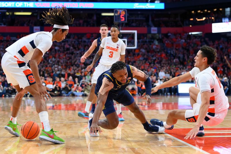 Jan 14, 2023; Syracuse, New York, USA; Notre Dame Fighting Irish guard J.J. Starling (1) collides with Syracuse Orange center Jesse Edwards (14) on a drive to the basket during the second half at the JMA Wireless Dome. Mandatory Credit: Rich Barnes-USA TODAY Sports