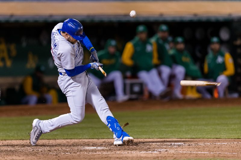 Apr 18, 2023; Oakland, California, USA;  Chicago Cubs third baseman Patrick Wisdom (16) breaks hits bat during the ninth inning against the Oakland Athletics  at RingCentral Coliseum. Mandatory Credit: John Hefti-USA TODAY Sports