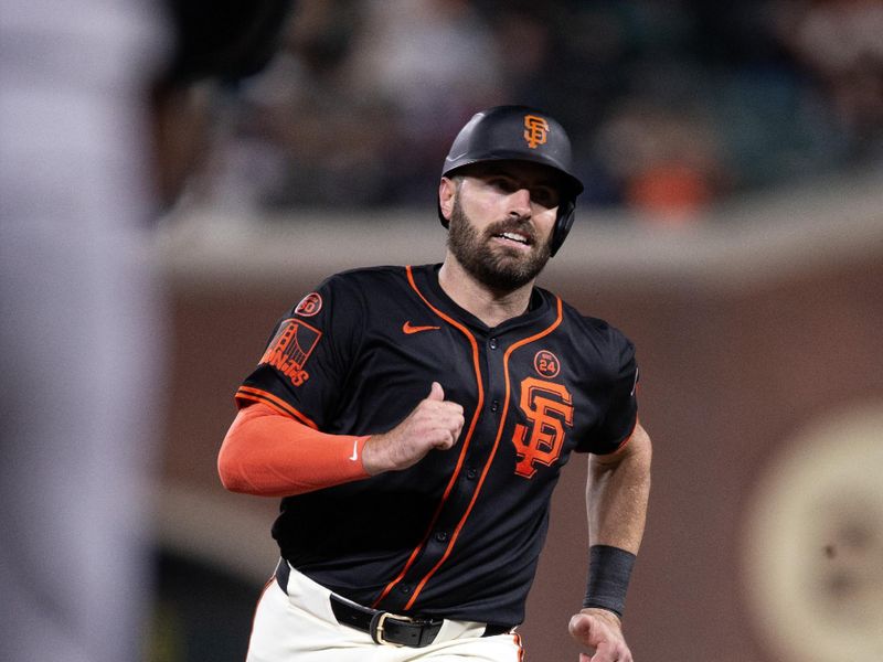 Jul 27, 2024; San Francisco, California, USA; San Francisco Giants catcher Curt Casali (18) goes from first to third on a double by designated hitter Jorge Soler (not pictured) during the fifth inning at Oracle Park. Mandatory Credit: D. Ross Cameron-USA TODAY Sports