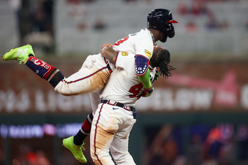 Apr 24, 2024; Atlanta, Georgia, USA; Atlanta Braves center fielder Michael Harris II (23) celebrates after a walk-off double with catcher Chadwick Tromp (45) against the Miami Marlins in the tenth inning at Truist Park. Mandatory Credit: Brett Davis-USA TODAY Sports
