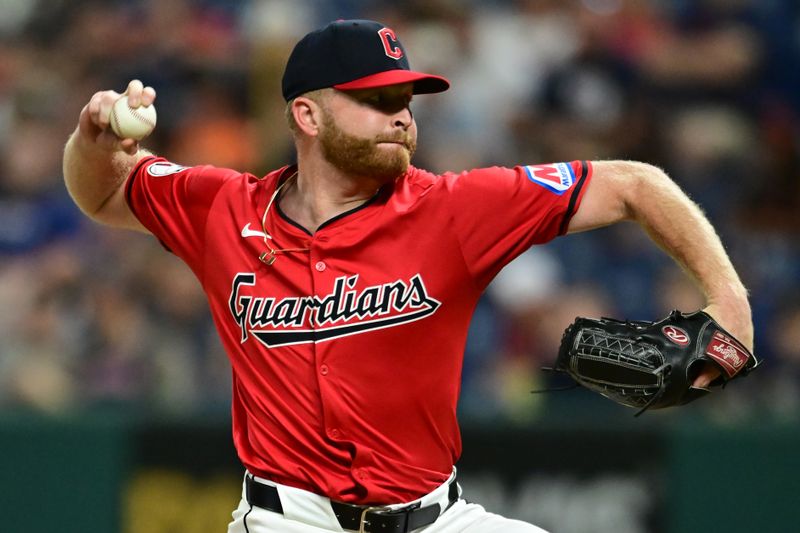 Sep 16, 2024; Cleveland, Ohio, USA; Cleveland Guardians relief pitcher Andrew Walters (63) throws a pitch during the eighth inning against the Minnesota Twins at Progressive Field. Mandatory Credit: Ken Blaze-Imagn Images