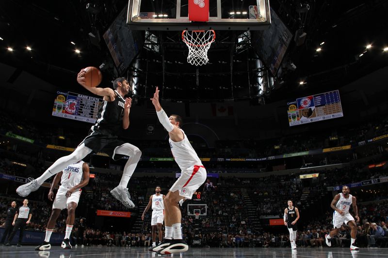 MEMPHIS, TN - FEBRUARY 23: Santi Aldama #7 of the Memphis Grizzlies passes the ball during the game against the LA Clippers on February 23, 2024 at FedExForum in Memphis, Tennessee. NOTE TO USER: User expressly acknowledges and agrees that, by downloading and or using this photograph, User is consenting to the terms and conditions of the Getty Images License Agreement. Mandatory Copyright Notice: Copyright 2024 NBAE (Photo by Joe Murphy/NBAE via Getty Images)