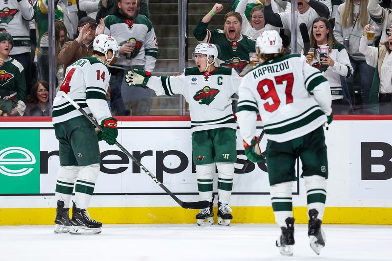 Nov 30, 2024; Saint Paul, Minnesota, USA; Minnesota Wild defenseman Jared Spurgeon (46) celebrates his game winning goal in overtime against the Nashville Predators at Xcel Energy Center. Mandatory Credit: Matt Krohn-Imagn Images