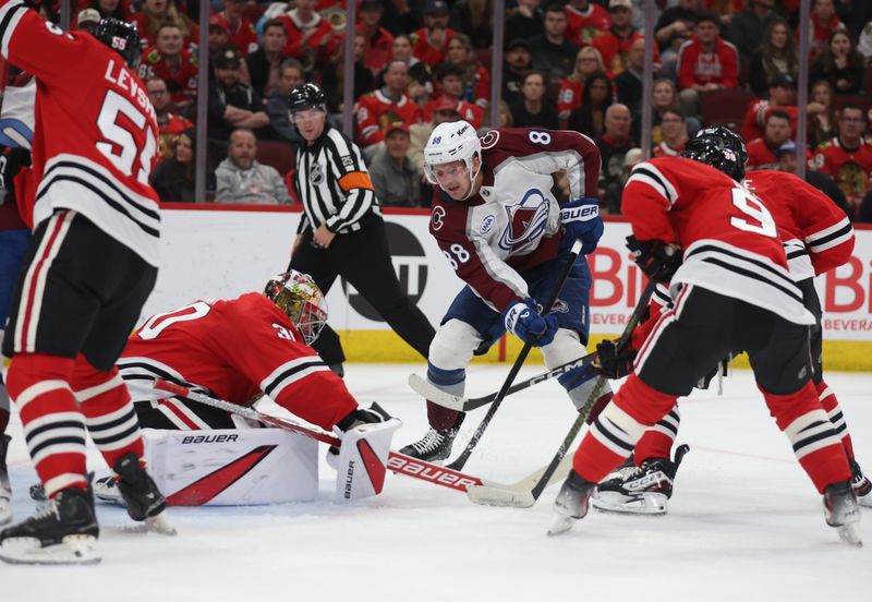 Apr 2, 2025; Chicago, Illinois, USA; Colorado Avalanche center Martin Necas (88) takes a shot on goal past Chicago Blackhawks goaltender Spencer Knight (30) during the second period at United Center. Mandatory Credit: Talia Sprague-Imagn Images