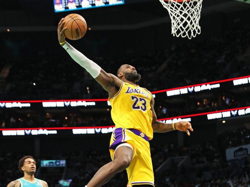 CHARLOTTE, NC - FEBRUARY 5: LeBron James #23 of the Los Angeles Lakers drives to the basket during the game against the Charlotte Hornets on February 5, 2024 at Spectrum Center in Charlotte, North Carolina. NOTE TO USER: User expressly acknowledges and agrees that, by downloading and or using this photograph, User is consenting to the terms and conditions of the Getty Images License Agreement.  Mandatory Copyright Notice:  Copyright 2024 NBAE (Photo by Brock Williams-Smith/NBAE via Getty Images)