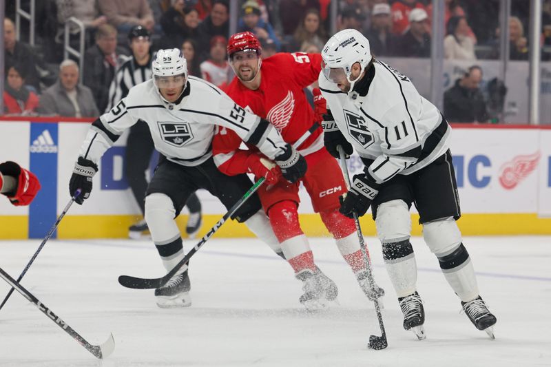 Jan 13, 2024; Detroit, Michigan, USA;  Los Angeles Kings center Anze Kopitar (11) skates with the puck in the first period against the Detroit Red Wings at Little Caesars Arena. Mandatory Credit: Rick Osentoski-USA TODAY Sports