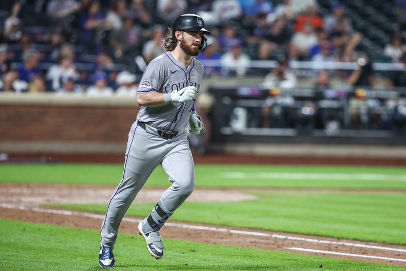 Jul 12, 2024; New York City, New York, USA;  Colorado Rockies second baseman Brendan Rodgers (7) hits a solo home run in the seventh inning against the New York Mets at Citi Field. Mandatory Credit: Wendell Cruz-USA TODAY Sports