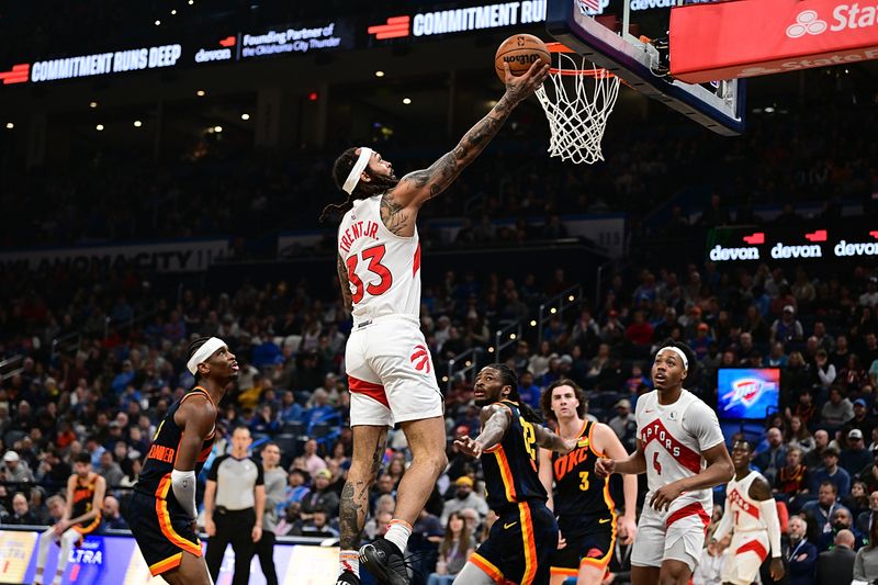 OKLAHOMA CITY, OKLAHOMA - FEBRUARY 4: Gary Trent Jr. #33 of the Toronto Raptors goes up for a layup during the first half against the Oklahoma City Thunder at Paycom Center on February 4, 2024 in Oklahoma City, Oklahoma. NOTE TO USER: User expressly acknowledges and agrees that, by downloading and or using this Photograph, user is consenting to the terms and conditions of the Getty Images License Agreement. (Photo by Joshua Gateley/Getty Images)