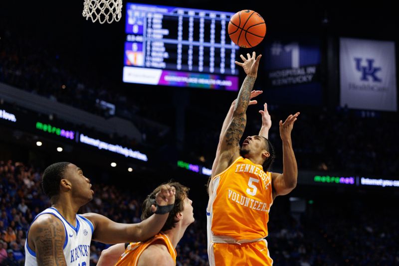 Feb 11, 2025; Lexington, Kentucky, USA; Tennessee Volunteers guard Zakai Zeigler (5) shoots the ball during the first half against the Kentucky Wildcats at Rupp Arena at Central Bank Center. Mandatory Credit: Jordan Prather-Imagn Images