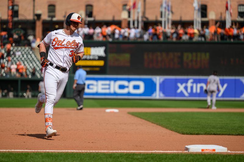 Aug 27, 2023; Baltimore, Maryland, USA; Baltimore Orioles first baseman Ryan O'Hearn (32) rounds third base after hitting a two run home run against the Colorado Rockies at Oriole Park at Camden Yards. Mandatory Credit: Reggie Hildred-USA TODAY Sports