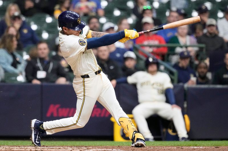 uApr 29, 2024; Milwaukee, Wisconsin, USA;  Milwaukee Brewers third baseman Joey Ortiz (3) hits a double during the sixth inning against the Tampa Bay Rays at American Family Field. Mandatory Credit: Jeff Hanisch-USA TODAY Sports