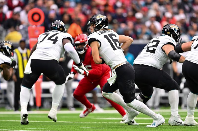 Jacksonville Jaguars quarterback Trevor Lawrence (16) in action during an NFL football game against the Houston Texans, Sunday, Nov 26, 2023, in Houston. (AP Photo/Maria Lysaker)