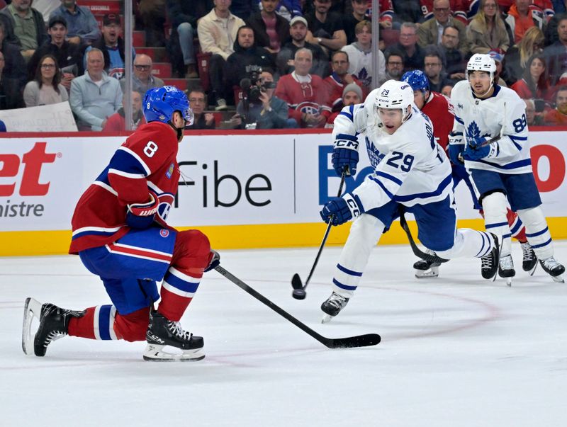 Oct 9, 2024; Montreal, Quebec, CAN; Montreal Canadiens defenseman Mike Matheson (8) blocks a shot from Toronto Maple Leafs forward Pontus Holmberg (29) during the third period at the Bell Centre. Mandatory Credit: Eric Bolte-Imagn Images