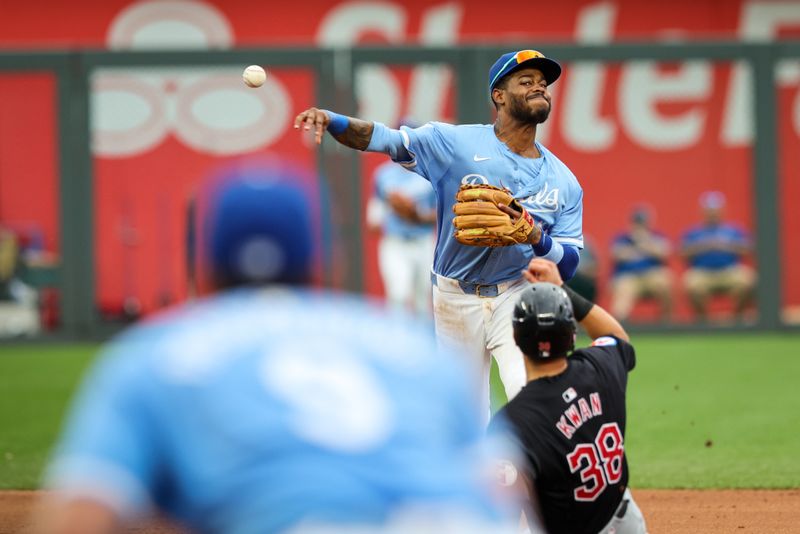 Jun 28, 2023; Kansas City, Missouri, USA; Kansas City Royals third base Maikel Garcia (11) throws to first base over Cleveland Guardians outfielder Steven Kwan (38) during the fifth inning at Kauffman Stadium. Mandatory Credit: William Purnell-USA TODAY Sports