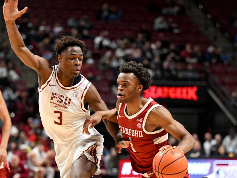 Jan 31, 2026; Tallahassee, Florida, USA; Stanford Cardinal guard Ebuka Okorie (1) drives to the net against Florida State Seminoles forward Thomas Bassong (3) during the second half at Donald L. Tucker Center. Mandatory Credit: Melina Myers-Imagn Images