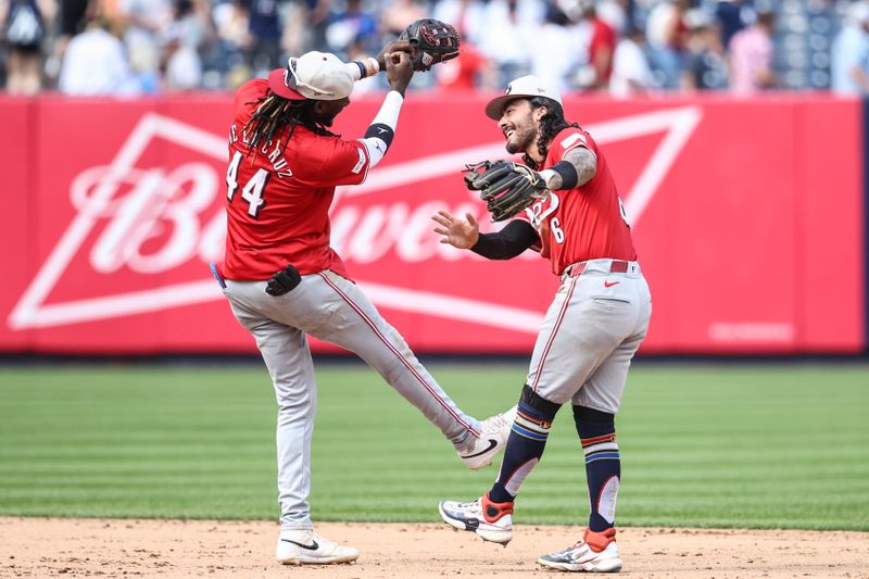 Jul 4, 2024; Bronx, New York, USA;  Cincinnati Reds shortstop Elly De La Cruz (44) and second baseman Jonathan India (6) celebrate after defeating the New York Yankees 8-4 at Yankee Stadium. Mandatory Credit: Wendell Cruz-USA TODAY Sports