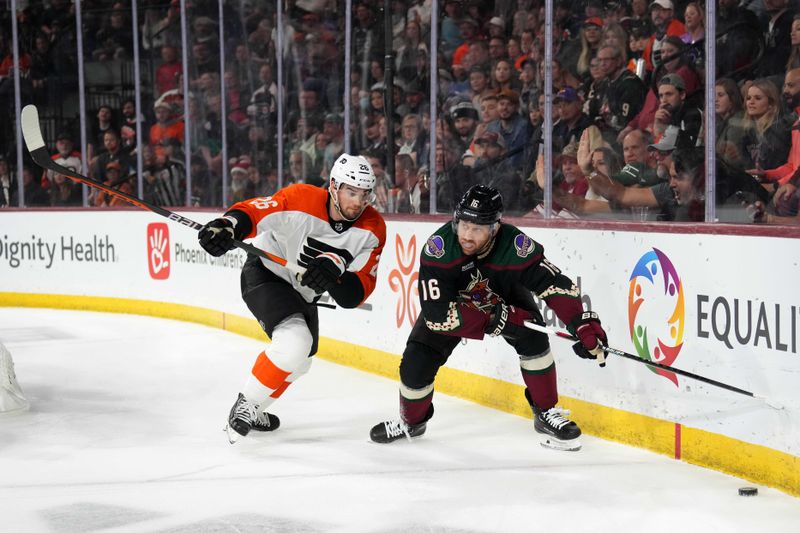 Dec 7, 2023; Tempe, Arizona, USA; Philadelphia Flyers defenseman Sean Walker (26) and Arizona Coyotes left wing Jason Zucker (16) skate after the puck during the second period at Mullett Arena. Mandatory Credit: Joe Camporeale-USA TODAY Sports