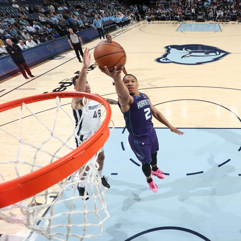 MEMPHIS, TN - MARCH 13: Grant Williams #2 of the Charlotte Hornets drives to the basket during the game against the Memphis Grizzlieson March 13, 2024 at FedExForum in Memphis, Tennessee. NOTE TO USER: User expressly acknowledges and agrees that, by downloading and or using this photograph, User is consenting to the terms and conditions of the Getty Images License Agreement. Mandatory Copyright Notice: Copyright 2024 NBAE (Photo by Joe Murphy/NBAE via Getty Images)