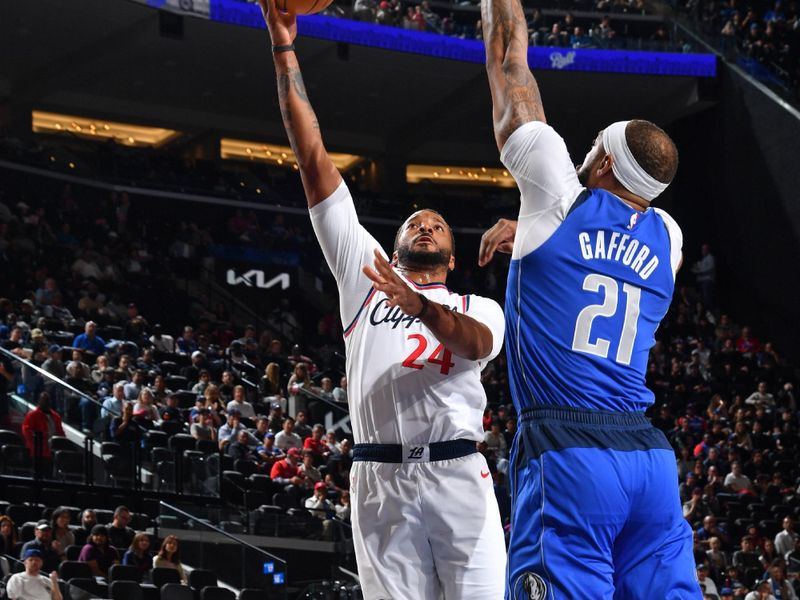 INGLEWOOD, CA - OCTOBER 14: Norman Powell #24 of the LA Clippers drives to the basket during the game against the Dallas Mavericks on October 14, 2024 at Intuit Dome in Los Angeles, California. NOTE TO USER: User expressly acknowledges and agrees that, by downloading and/or using this Photograph, user is consenting to the terms and conditions of the Getty Images License Agreement. Mandatory Copyright Notice: Copyright 2024 NBAE (Photo by Juan Ocampo/NBAE via Getty Images)