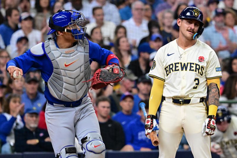 May 27, 2024; Milwaukee, Wisconsin, USA; Milwaukee Brewers third baseman Joey Ortiz (3) reacts after being called out on strikes in the second inning against the Chicago Cubs at American Family Field. Mandatory Credit: Benny Sieu-USA TODAY Sports