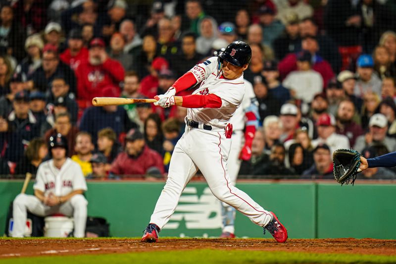 Sep 26, 2023; Boston, Massachusetts, USA; Boston Red Sox left fielder Masataka Yoshida (7) hits a ground rule double against the Tampa Bay Rays in the sixth inning at Fenway Park. Mandatory Credit: David Butler II-USA TODAY Sports