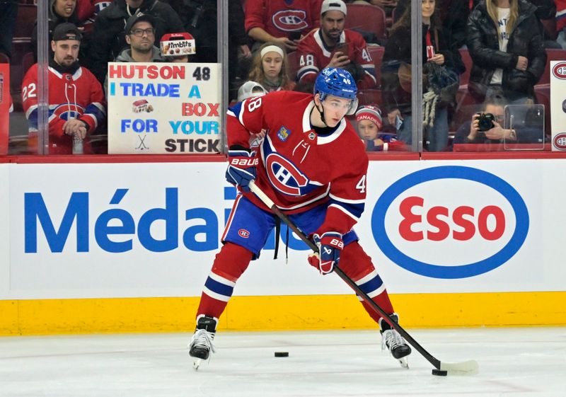 Apr 8, 2025; Montreal, Quebec, CAN; Montreal Canadiens defenseman Lane Hutson (48) skates during the warmup period before the game against the Detroit Red Wings at the Bell Centre. Mandatory Credit: Eric Bolte-Imagn Images
