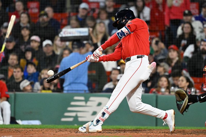 Sep 22, 2024; Boston, MA, USA;  Boston Red Sox shortstop Nick Sogard (75) hits a double against the Minnesota Twins during the sixth inning at Fenway Park. Mandatory Credit: Eric Canha-Imagn Images