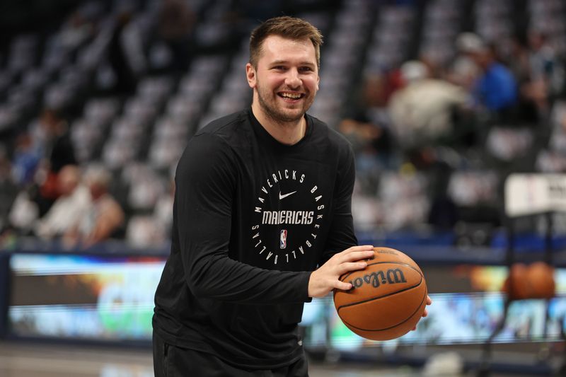 DALLAS, TX - NOVEMBER 16: Luka Doncic #77 of the Dallas Mavericks warms up before the game against the San Antonio Spurs on November 16, 2024 at American Airlines Center in Dallas, Texas. NOTE TO USER: User expressly acknowledges and agrees that, by downloading and or using this photograph, User is consenting to the terms and conditions of the Getty Images License Agreement. Mandatory Copyright Notice: Copyright 2024 NBAE (Photo by Tim Heitman/NBAE via Getty Images)