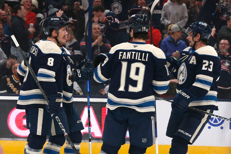 Nov 15, 2024; Columbus, Ohio, USA; Columbus Blue Jackets defenseman Zach Werenski (8) celebrates his goal against the Pittsburgh Penguins during the first period at Nationwide Arena. Mandatory Credit: Russell LaBounty-Imagn Images