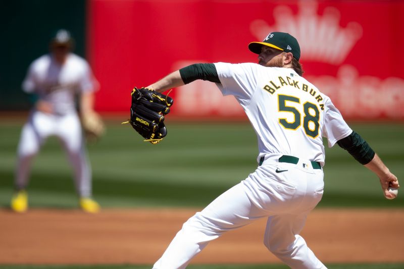 Apr 17, 2024; Oakland, California, USA; Oakland Athletics starting pitcher Paul Blackburn (58) delivers a pitch against the St. Louis Cardinals during the second inning at Oakland-Alameda County Coliseum. Mandatory Credit: D. Ross Cameron-USA TODAY Sports