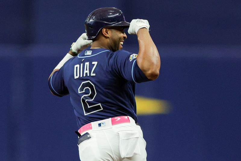 Sep 9, 2023; St. Petersburg, Florida, USA;  Tampa Bay Rays first baseman Yandy Diaz (2) celebrates after hitting  a walk off two-run home run against the Seattle Mariners in the ninth inning at Tropicana Field. Mandatory Credit: Nathan Ray Seebeck-USA TODAY Sports