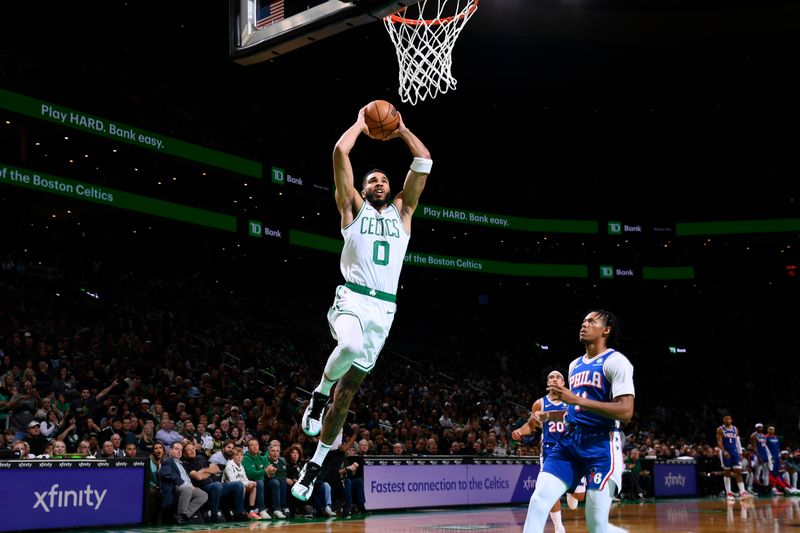 BOSTON, MA - OCTOBER 12: Jayson Tatum #0 of the Boston Celtics dunks the ball during the game against the Philadelphia 76ers during a NBA Preseason game on October 12, 2024 at TD Garden in Boston, Massachusetts. NOTE TO USER: User expressly acknowledges and agrees that, by downloading and/or using this Photograph, user is consenting to the terms and conditions of the Getty Images License Agreement. Mandatory Copyright Notice: Copyright 2024 NBAE (Photo by Brian Babineau/NBAE via Getty Images)