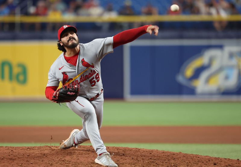 Aug 10, 2023; St. Petersburg, Florida, USA;  St. Louis Cardinals relief pitcher JoJo Romero (59) throws a pitch against the Tampa Bay Rays during the ninth inning at Tropicana Field. Mandatory Credit: Kim Klement Neitzel-USA TODAY Sports