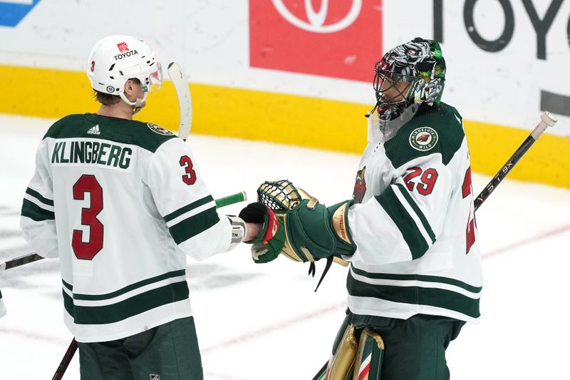 Mar 11, 2023; San Jose, California, USA; Minnesota Wild defenseman John Klingberg (3) and goaltender Marc-Andre Fleury (29) celebrate after defeating the San Jose Sharks at SAP Center at San Jose. Mandatory Credit: Darren Yamashita-USA TODAY Sports