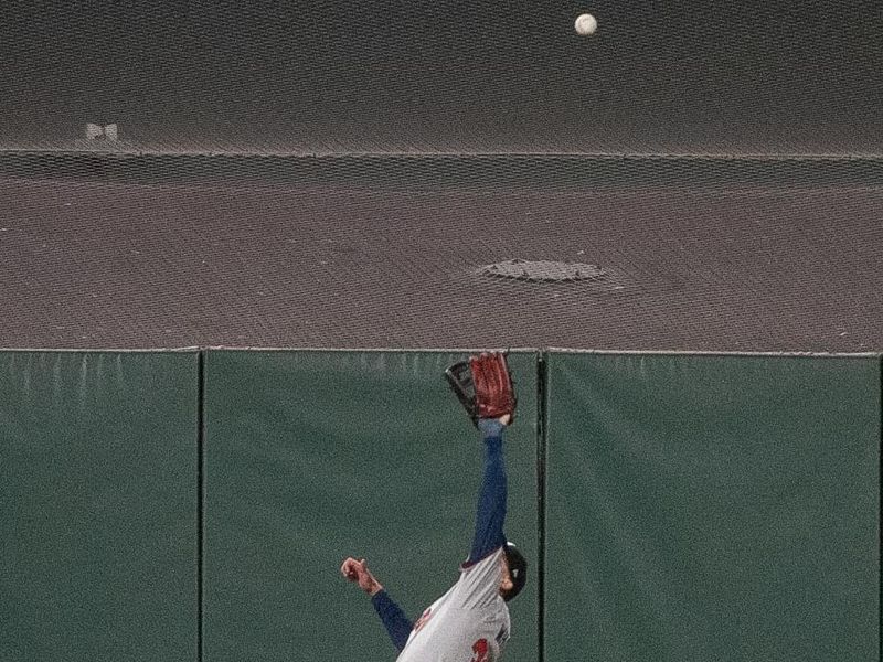 Aug 13, 2024; San Francisco, California, USA;  Atlanta Braves outfielder Eli White (36) makes a catch against the San Francisco Giants during the ninth inning at Oracle Park. Mandatory Credit: Ed Szczepanski-USA TODAY Sports