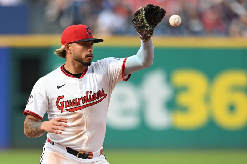 Jun 7, 2025; Cleveland, Ohio, USA; Cleveland Guardians shortstop Gabriel Arias (13) fields a ball hit by Houston Astros shortstop Jeremy Pena (not pictured) during the seventh inning at Progressive Field. Mandatory Credit: Ken Blaze-Imagn Images
