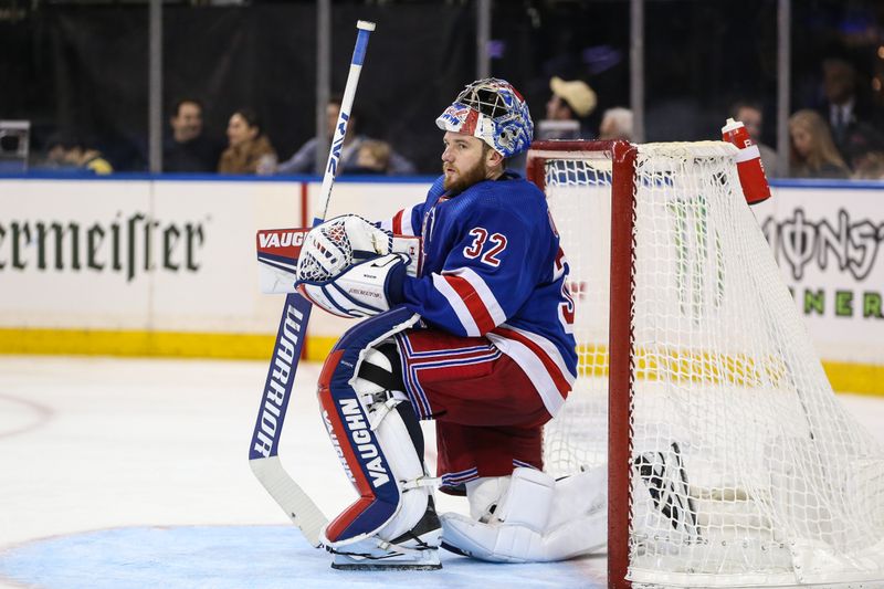 Dec 3, 2023; New York, New York, USA;  New York Rangers goaltender Jonathan Quick (32) gets ready for play to resume in the third period against the San Jose Sharks at Madison Square Garden. Mandatory Credit: Wendell Cruz-USA TODAY Sports