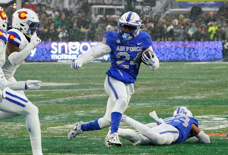 Oct 28, 2023; Fort Collins, Colorado, USA;  Air Force Falcons running back John Lee Eldridge III (24) carries during the first quarter against the Colorado State Rams at Sonny Lubick Field at Canvas Stadium. Mandatory Credit: Michael Madrid-USA TODAY Sports