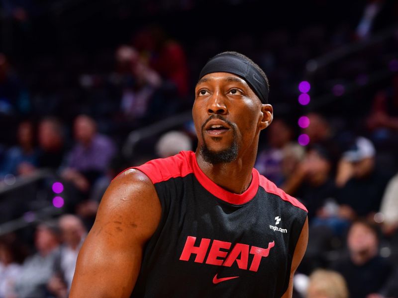 PHOENIX, AZ - NOVEMBER 6: Bam Adebayo #13 of the Miami Heat looks on before the game against the Phoenix Suns on November 6, 2024 at Footprint Center in Phoenix, Arizona. NOTE TO USER: User expressly acknowledges and agrees that, by downloading and or using this photograph, user is consenting to the terms and conditions of the Getty Images License Agreement. Mandatory Copyright Notice: Copyright 2024 NBAE (Photo by Barry Gossage/NBAE via Getty Images)