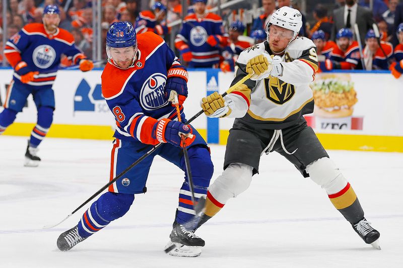 Apr 10, 2024; Edmonton, Alberta, CAN; Edmonton Oilers forward Zach Hyman (18) takes a shot in front of Vegas Golden Knights forward Jack Eichel (9) during the first period at Rogers Place. Mandatory Credit: Perry Nelson-USA TODAY Sports