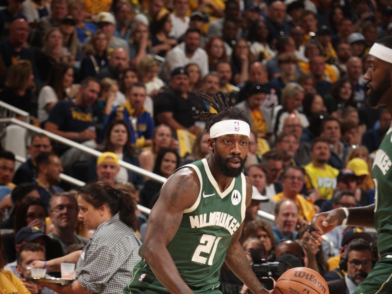 INDIANAPOLIS, IN - APRIL 28: Patrick Beverley #21 of the Milwaukee Bucks dribbles the ball during the game against the Indiana Pacers during Round 1 Game 4 of the 2024 NBA Playoffs on April 28, 2024 at Gainbridge Fieldhouse in Indianapolis, Indiana. NOTE TO USER: User expressly acknowledges and agrees that, by downloading and or using this Photograph, user is consenting to the terms and conditions of the Getty Images License Agreement. Mandatory Copyright Notice: Copyright 2024 NBAE (Photo by Nathaniel S. Butler/NBAE via Getty Images)