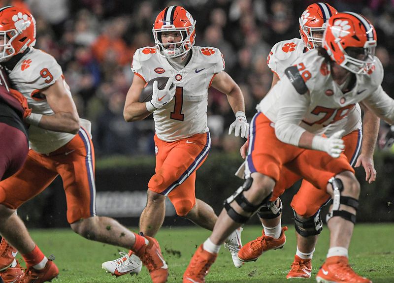 Nov 25, 2023; Columbia, South Carolina, USA; Clemson Tigers running back Will Shipley (1) runs the ball against the South Carolina Gamecocks during the second quarter at Williams-Brice Stadium. Mandatory Credit: Ken Ruinard-USA TODAY Sports