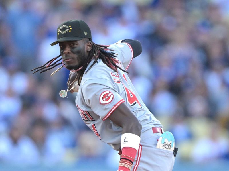 May 18, 2024; Los Angeles, California, USA;  Cincinnati Reds shortstop Elly De La Cruz (44) throws to first for an out in the second inning against the Los Angeles Dodgers at Dodger Stadium. Mandatory Credit: Jayne Kamin-Oncea-USA TODAY Sports