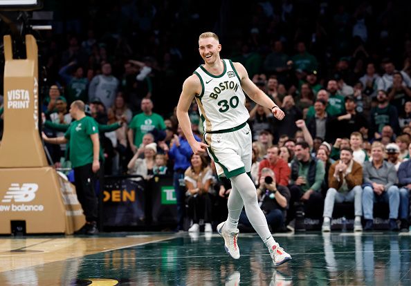 Boston, MA - November 28: Boston Celtics SF Sam Hauser smiles after a dunk in the second half. The Celtics beat the Chicago Bulls, 124-97. (Photo by Danielle Parhizkaran/The Boston Globe via Getty Images)