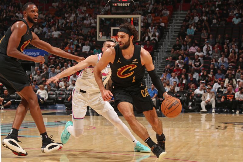 MIAMI, FL - JANUARY 29: Max Strus #1 of the Cleveland Cavaliers handles the ball during the game against the Miami Heat on January 29, 2025 at Kaseya Center in Miami, Florida. NOTE TO USER: User expressly acknowledges and agrees that, by downloading and or using this Photograph, user is consenting to the terms and conditions of the Getty Images License Agreement. Mandatory Copyright Notice: Copyright 2025 NBAE (Photo by Issac Baldizon/NBAE via Getty Images)