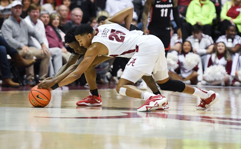 Feb 18, 2023; Tuscaloosa, Alabama, USA; Georgia Bulldogs guard Terry Roberts (0) and Alabama Crimson Tide guard Nimari Burnett (25) scramble for a loose ball at Coleman Coliseum. Alabama won 108-59. Mandatory Credit: Gary Cosby Jr.-USA TODAY Sports