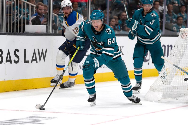 Oct 10, 2024; San Jose, California, USA;  San Jose Sharks center Mikael Granlund (64) controls the puck during the third period against the St. Louis Blues at SAP Center at San Jose. Mandatory Credit: Stan Szeto-Imagn Images