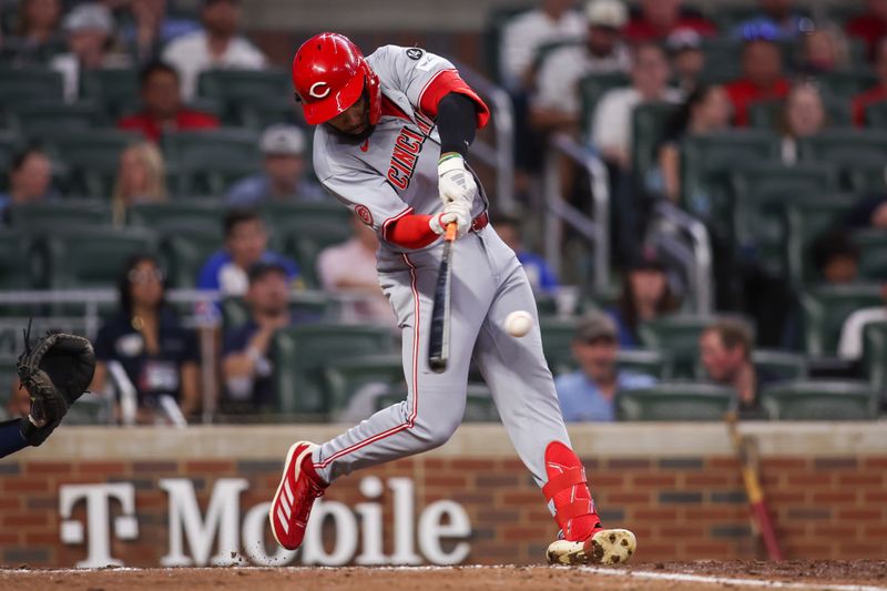 May 8, 2025; Atlanta, Georgia, USA; Cincinnati Reds right fielder Rece Hinds (57) hits a two-run home run against the Atlanta Braves in the ninth inning at Truist Park. Mandatory Credit: Brett Davis-Imagn Images