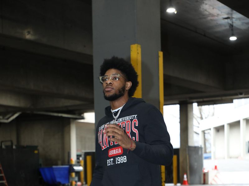 PORTLAND, OR - FEBRUARY 25:  Scoot Henderson #00 of the Portland Trail Blazers arrives to the arena before the game on February 25, 2024 at the Moda Center Arena in Portland, Oregon. NOTE TO USER: User expressly acknowledges and agrees that, by downloading and or using this photograph, user is consenting to the terms and conditions of the Getty Images License Agreement. Mandatory Copyright Notice: Copyright 2024 NBAE (Photo by Cameron Browne/NBAE via Getty Images)